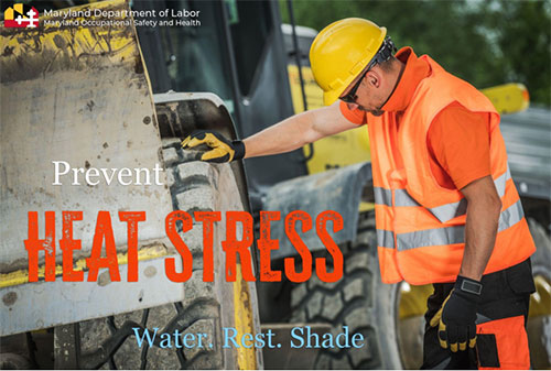 image of man outside in a hard hat leaning on a piece of equipment taking a rest break