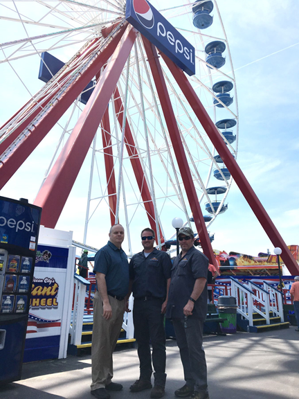 Pictured L to R: Safety Program Manager David Dearborn, Inspector Robbie Finecy and Inspector Pete Yeagy in front of the reassembled Giant Ferris Wheel in Ocean City, Maryland.